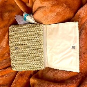 Brand new weave clutch